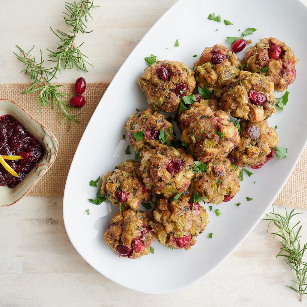 Thanksgiving stuffing bites with herbs on plate
