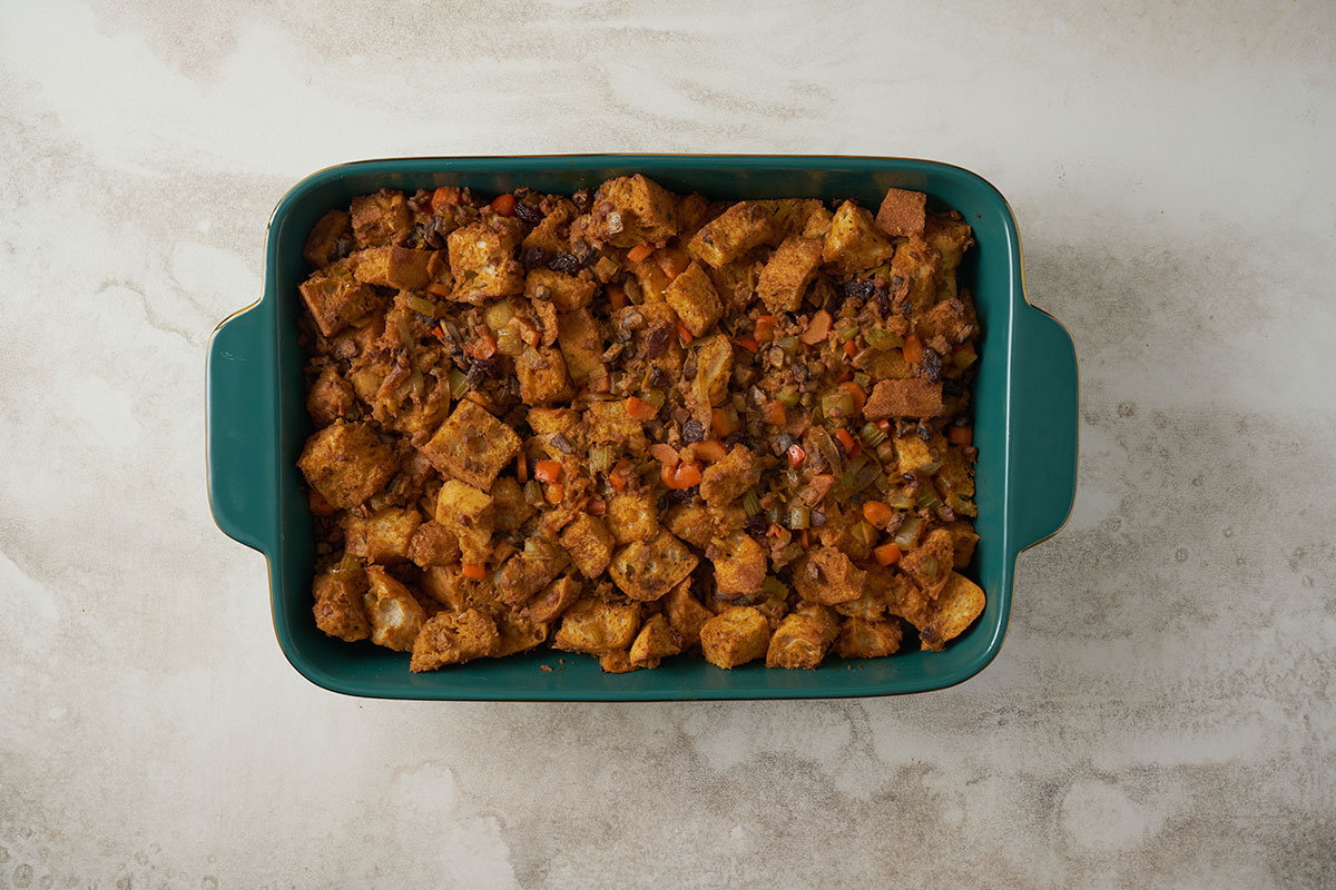 Pacific Spice Company’s Vegetarian Stuffing Casserole, featuring PSC Sage and Savory Stuffing Seasoning, is baked to golden perfection for a delicious holiday dish.